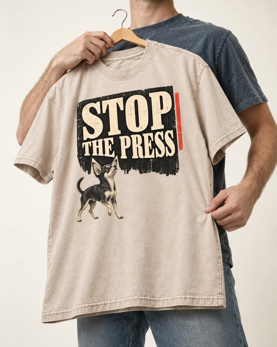 Stop the Press Chihuahua Washed Tee in Apricot, held up on a hanger