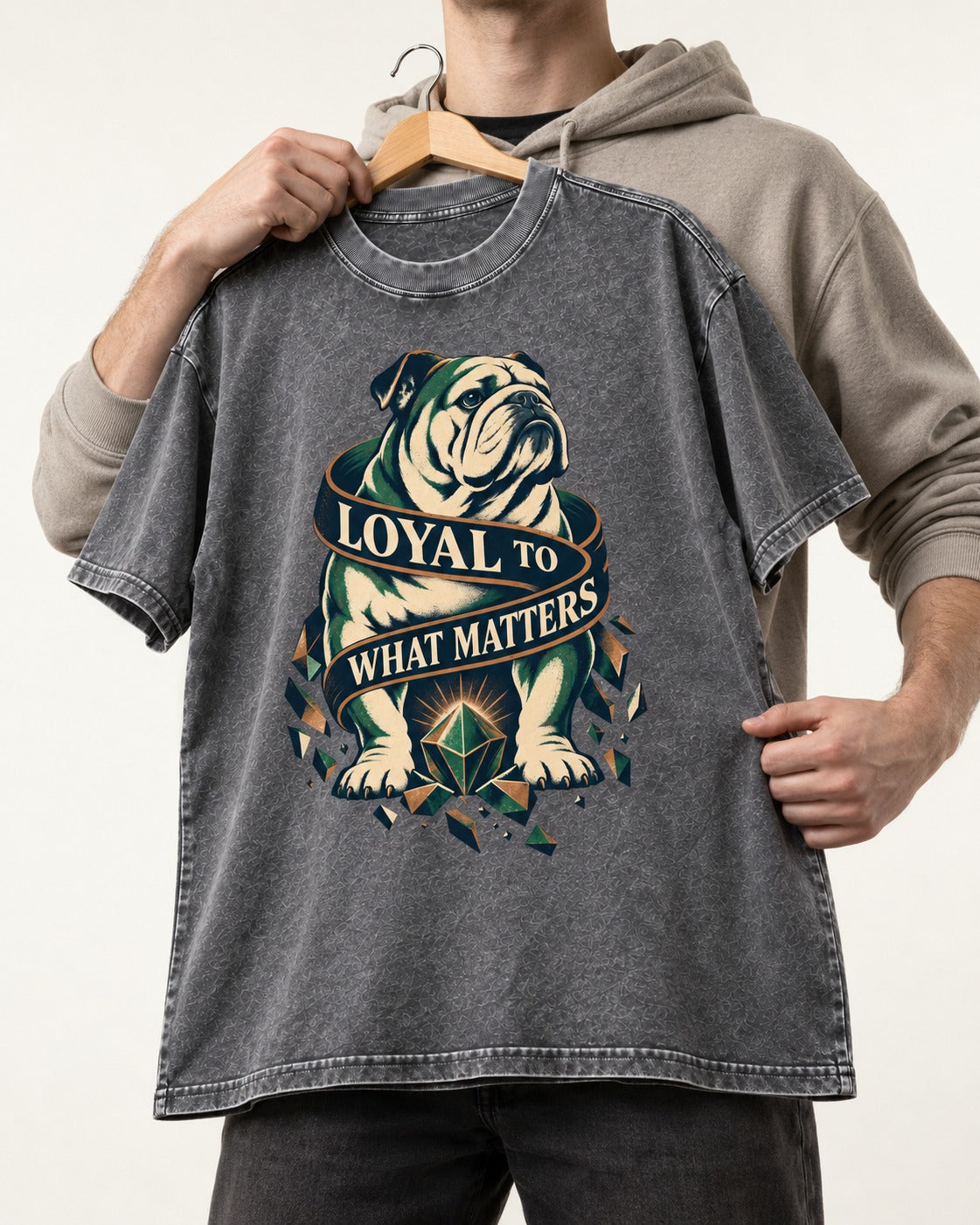 Loyal to What Matters English Bulldog Washed Tee in Gray, held up on a hanger