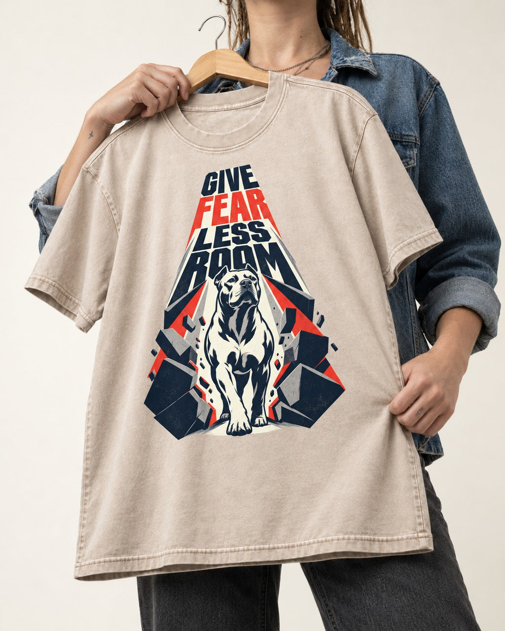 Pitbull Give Fear Less Room Breakthrough Graphic Washed Tee in Apricot, held up on a hanger