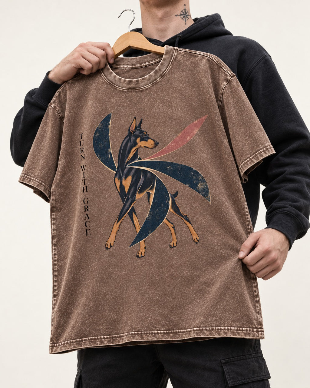Turn with Doberman Grace Washed Tee in Coffee, held up on a hanger