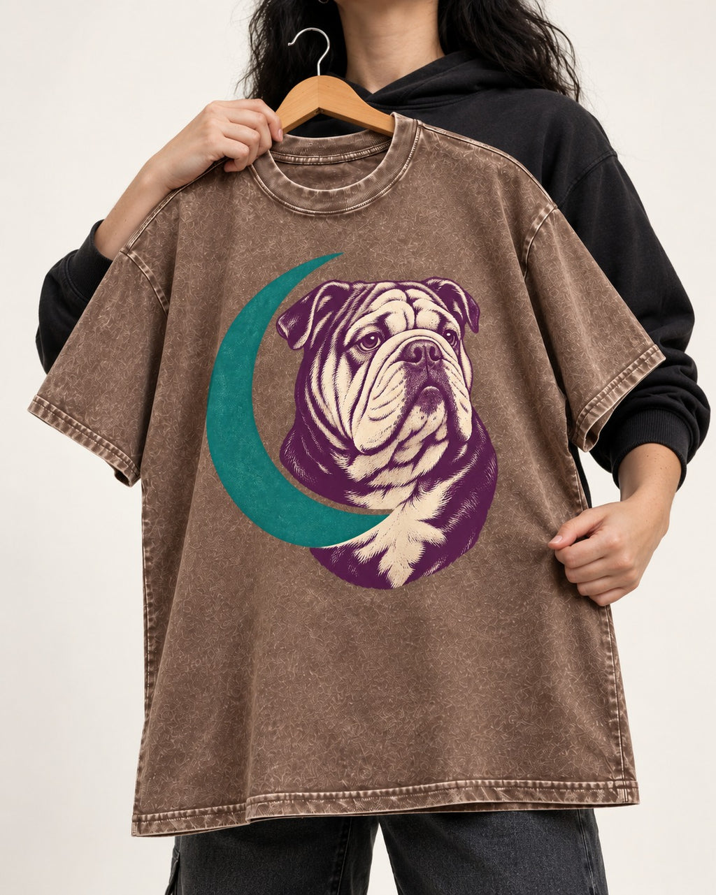Moonstruck English Bulldog Washed Tee in Coffee, held up on a hanger