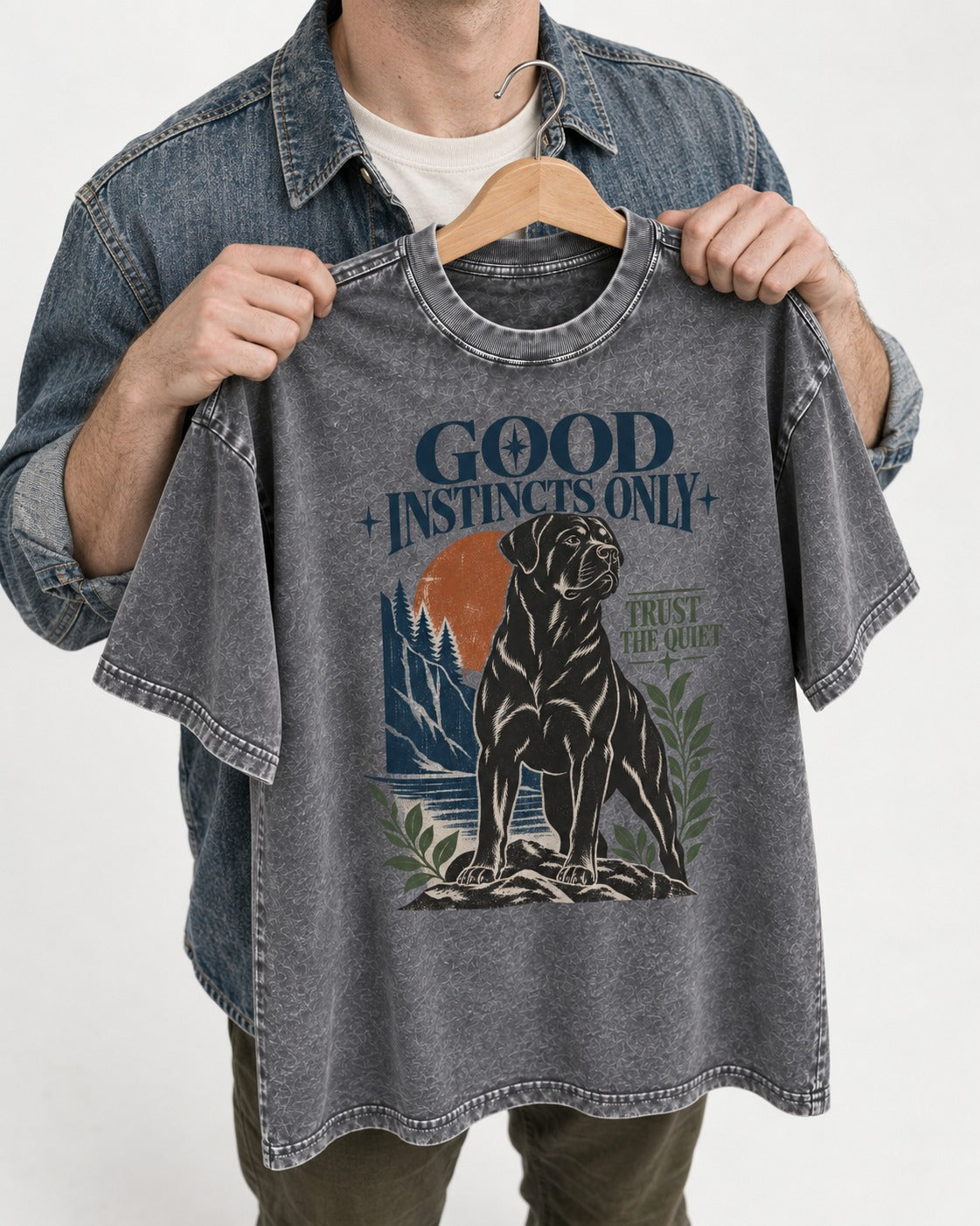 Good Instincts Only Rottweiler Washed Tee in Gray, held up on a hanger
