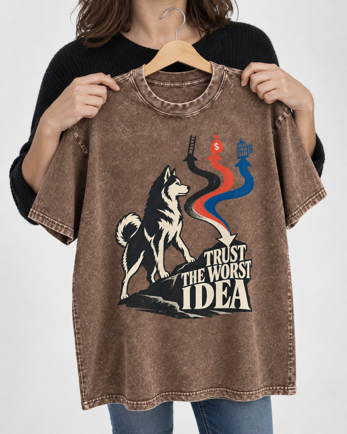 Trust the Worst Husky Idea Washed Tee in Coffee, held up on a hanger
