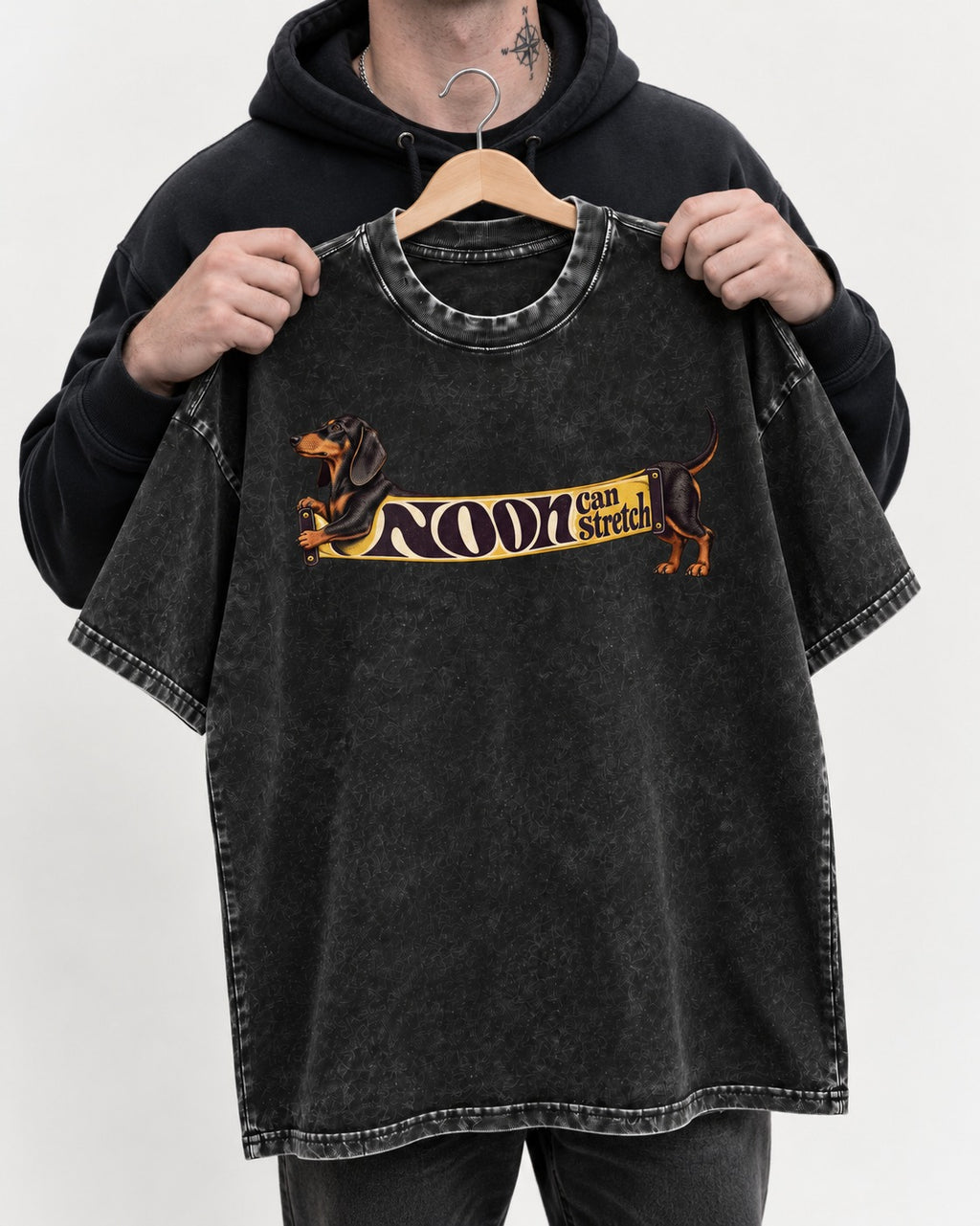 Dachshund Noon Can Stretch Sign Graphic Washed Tee in Black, held up on a hanger
