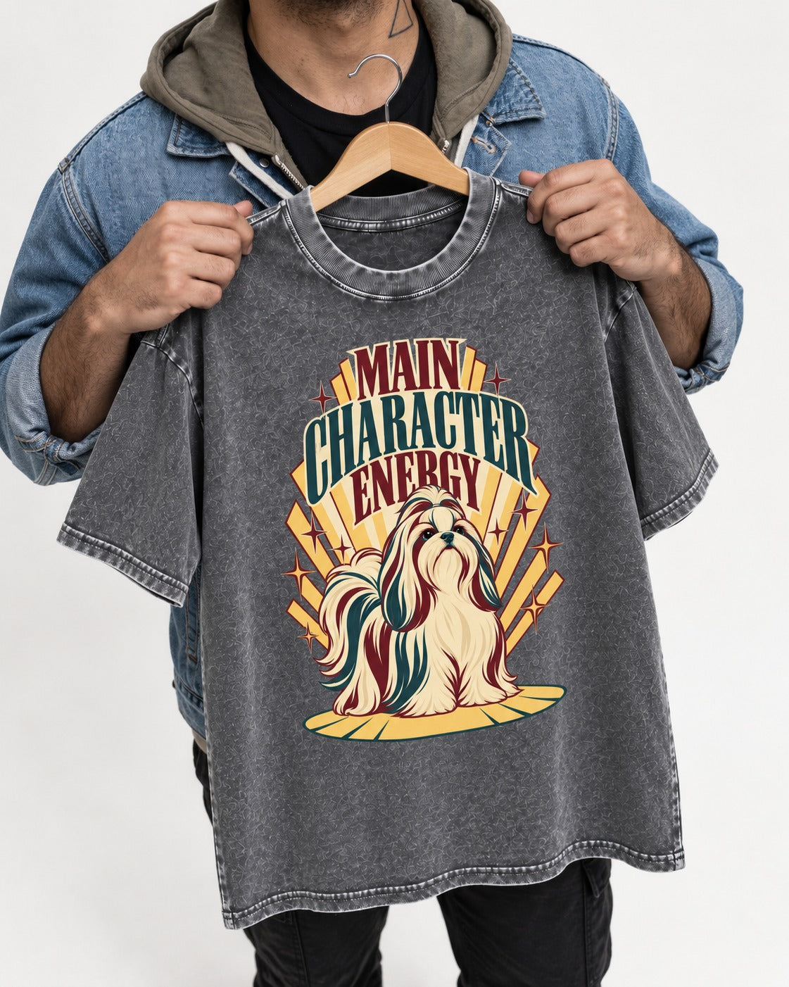 Shih Tzu Main Character Energy Art Deco Graphic Washed Tee in Gray, held up on a hanger