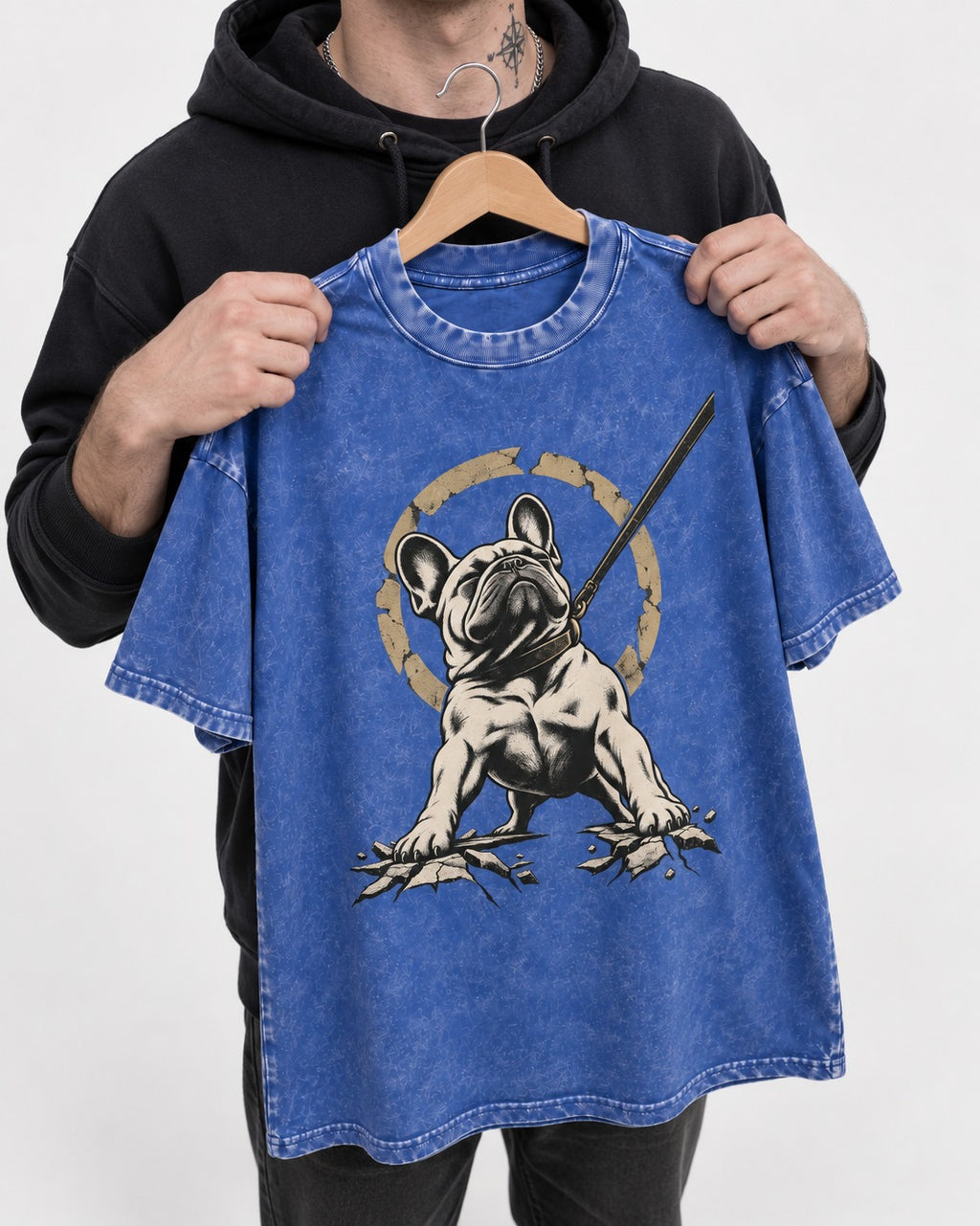 Frenchie Stubborn Leash Monument Graphic Washed Tee in Royal Blue, held up on a hanger