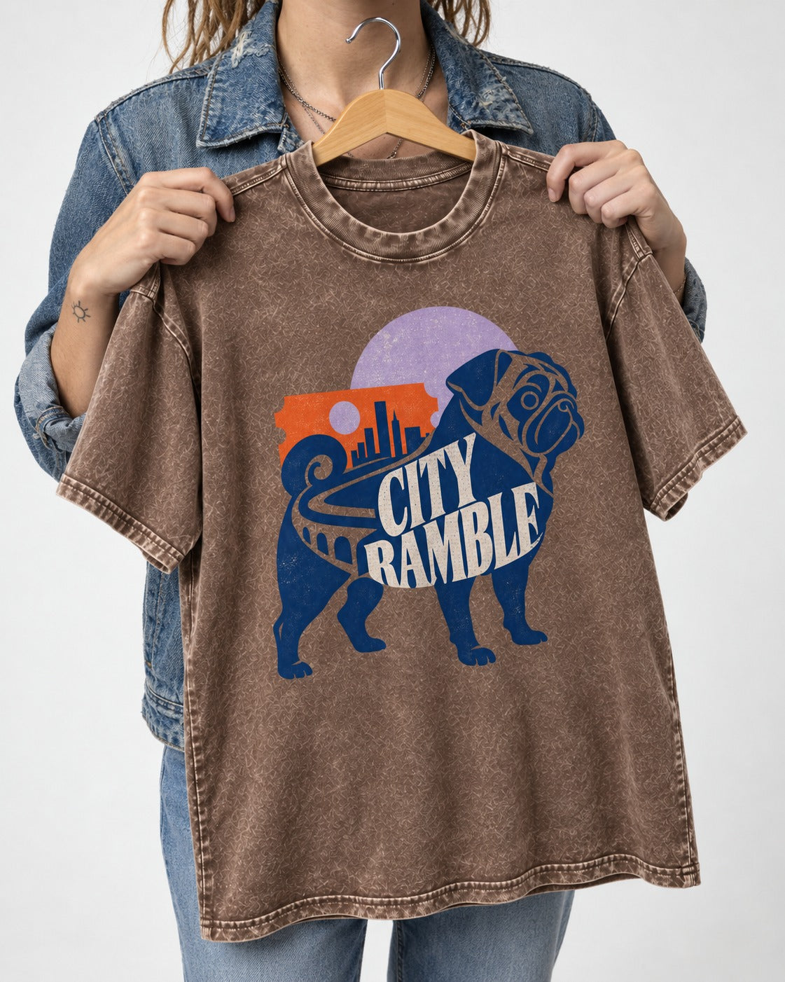 Pug's Big City Ramble Washed Tee in Coffee, held up on a hanger