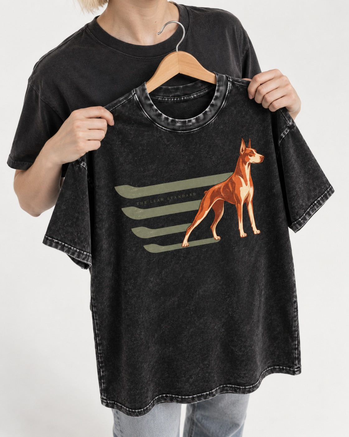 Doberman The Lean Standard Speed Bars Graphic Washed Tee in Black, held up on a hanger