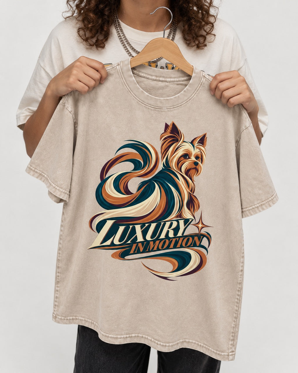 Yorkshire Terrier Luxury in Motion Washed Tee in Apricot, held up on a hanger