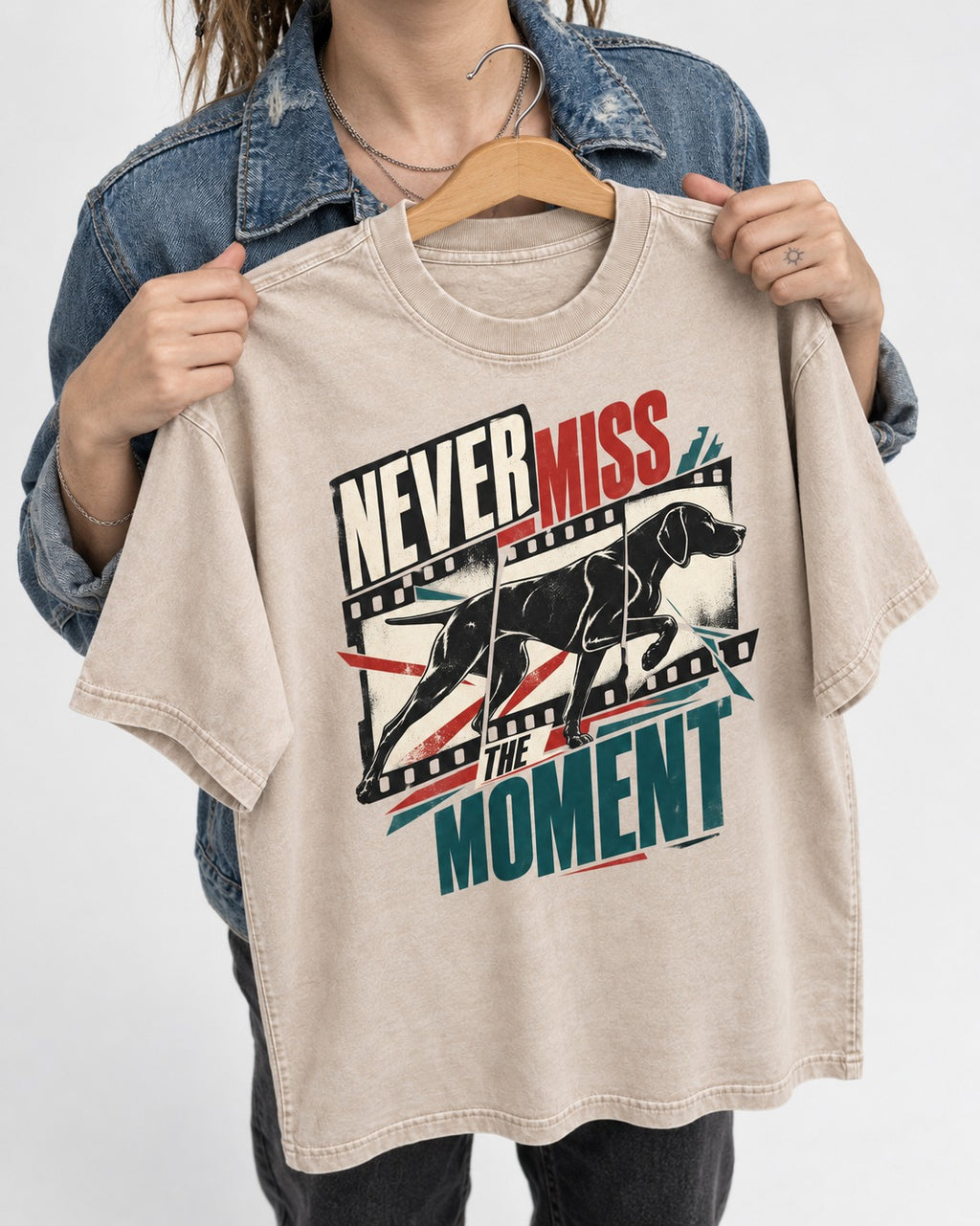 German Shorthaired Pointer Never Miss the Moment Filmstrip Graphic Washed Tee in Apricot, held up on a hanger