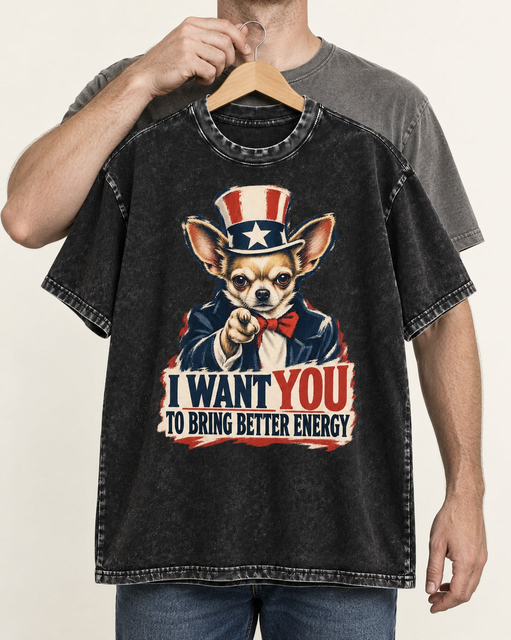 Chihuahua I Want You to Bring Better Energy Uncle Sam Graphic Washed Tee in Black, held up on a hanger