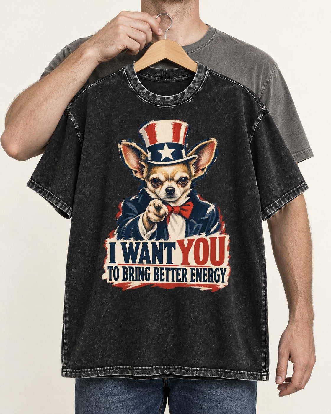 Chihuahua I Want You to Bring Better Energy Uncle Sam Graphic Washed Tee in Black, held up on a hanger