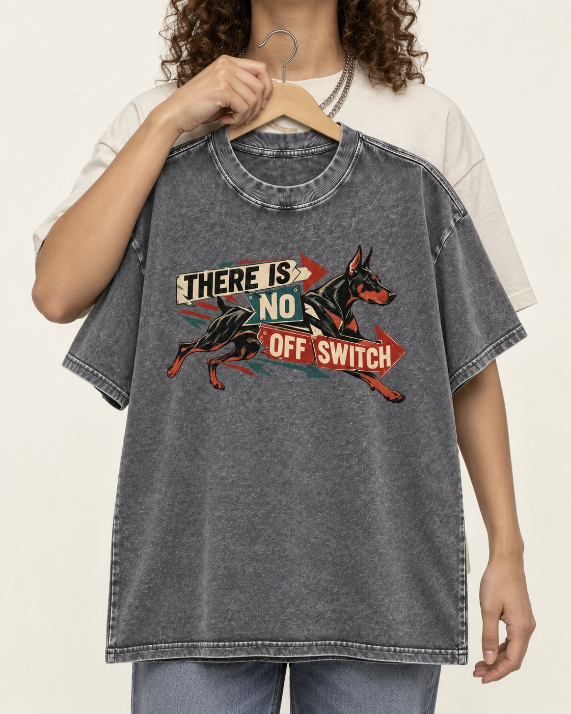 Doberman There Is No Off Switch Arrow Sprint Graphic Washed Tee in Gray, held up on a hanger