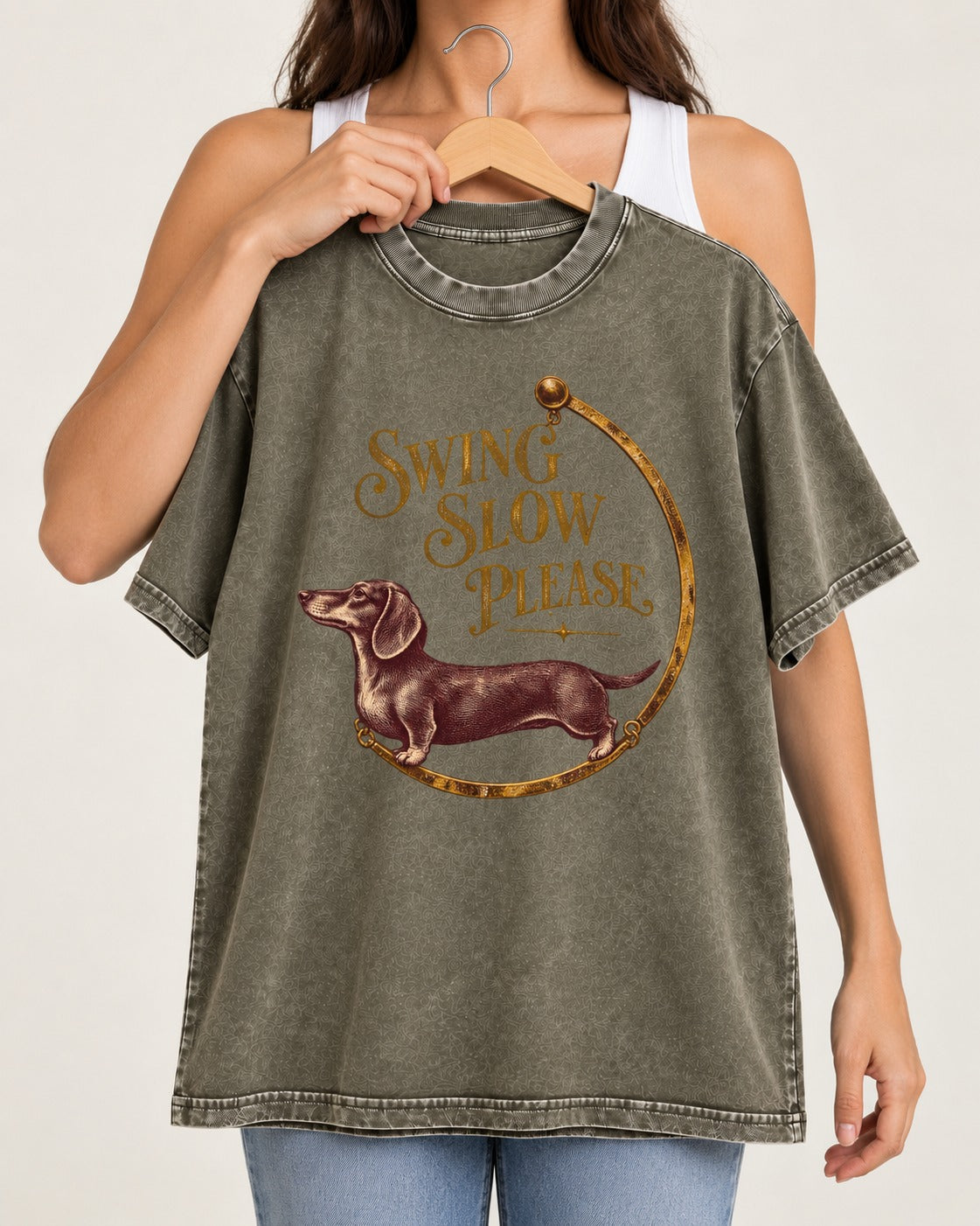 Dachshund Swing Slow Please Necklace Frame Graphic Washed Tee in Army Green, held up on a hanger