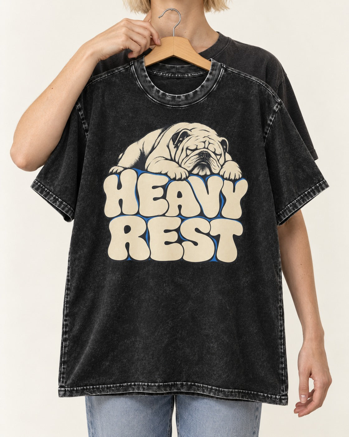 English Bulldog Heavy Rest Graphic Washed Tee in Black, held up on a hanger