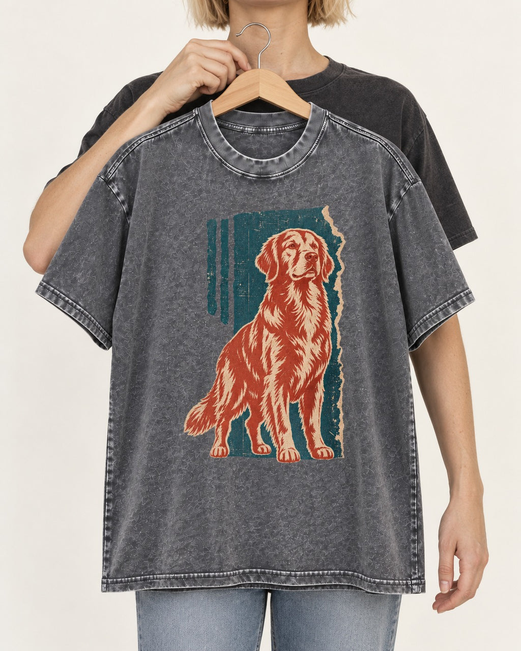 Golden Retriever Steadfast Heart Washed Tee in Gray, held up on a hanger