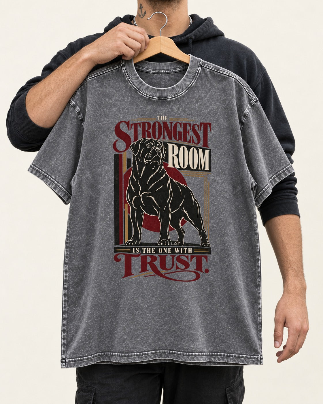 Rottweiler Trust Washed Tee in Gray, held up on a hanger