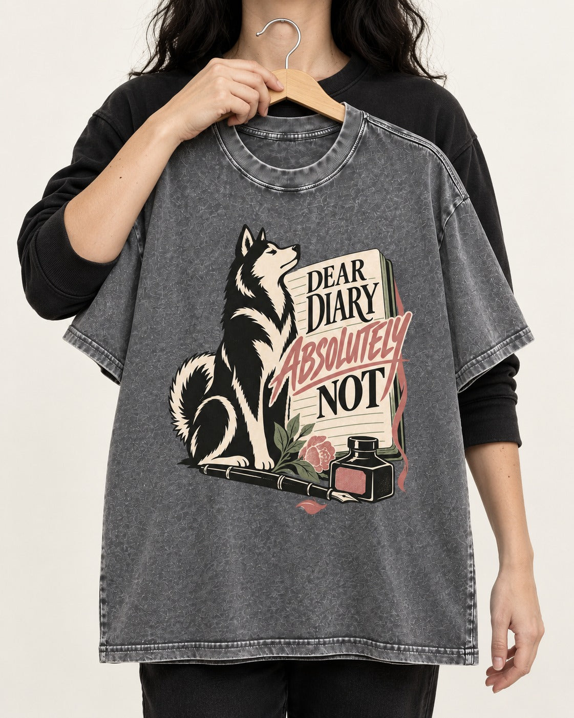 Husky Absolutely Not Washed Tee in Gray, held up on a hanger