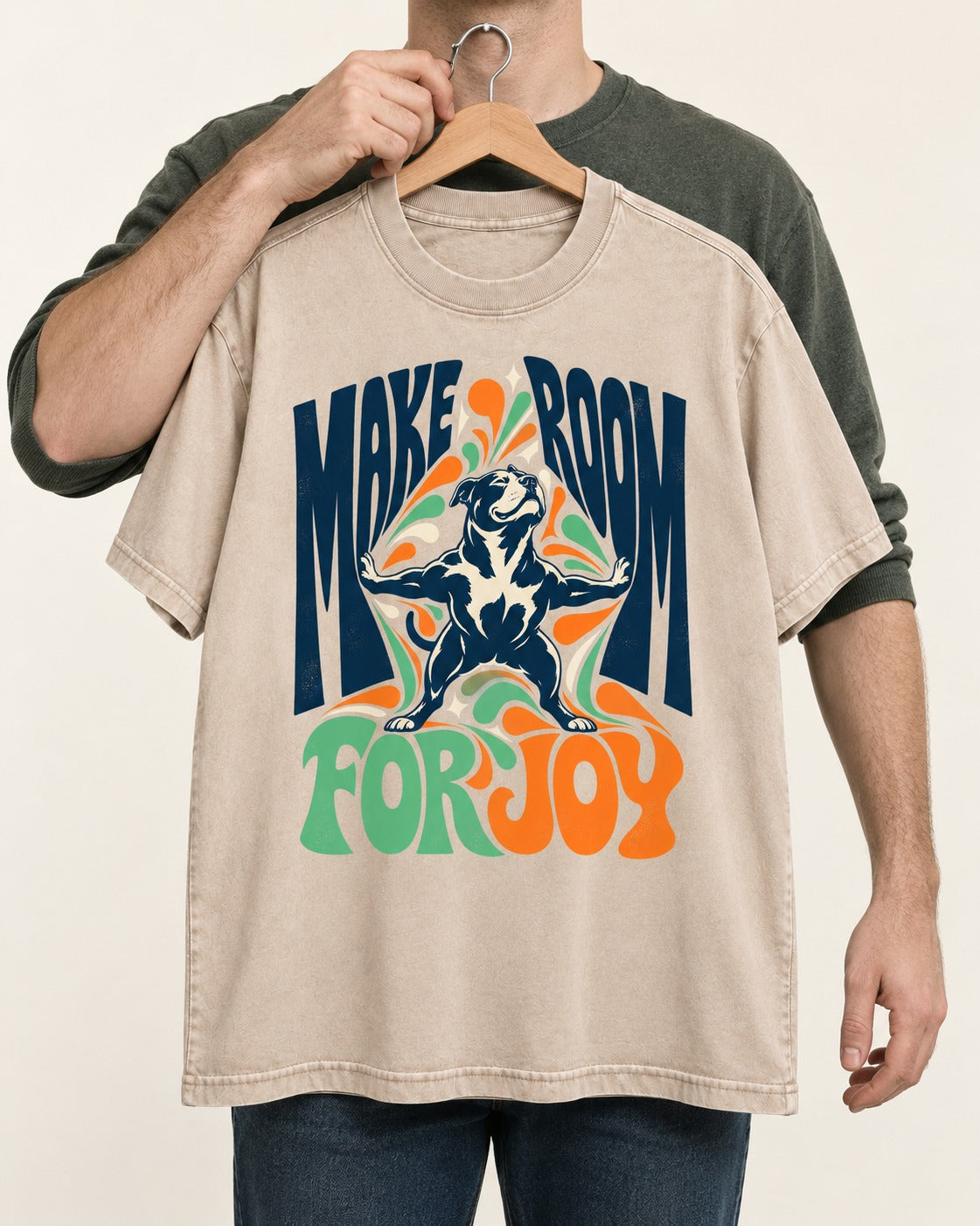 Pitbull Make Room for Joy Washed Tee in Apricot, held up on a hanger