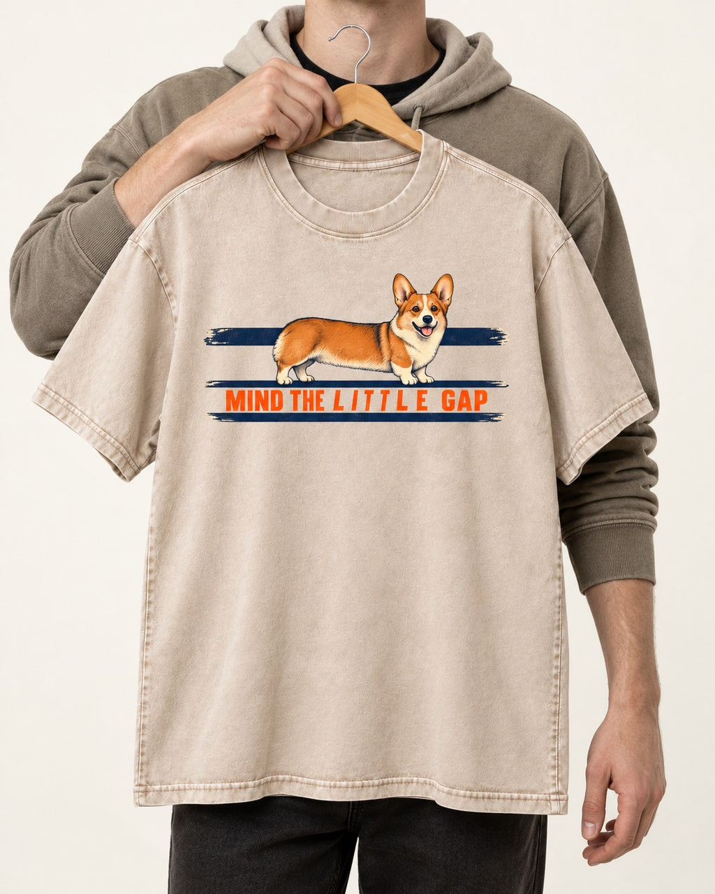 Mind the Little Corgi Gap Washed Tee in Apricot, held up on a hanger