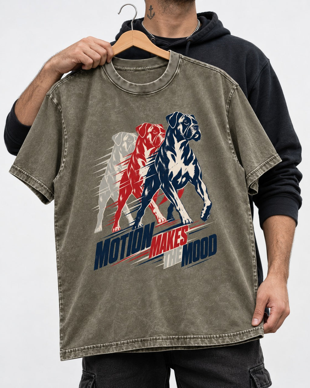 Boxer Motion Makes the Mood Washed Tee in Army Green, held up on a hanger