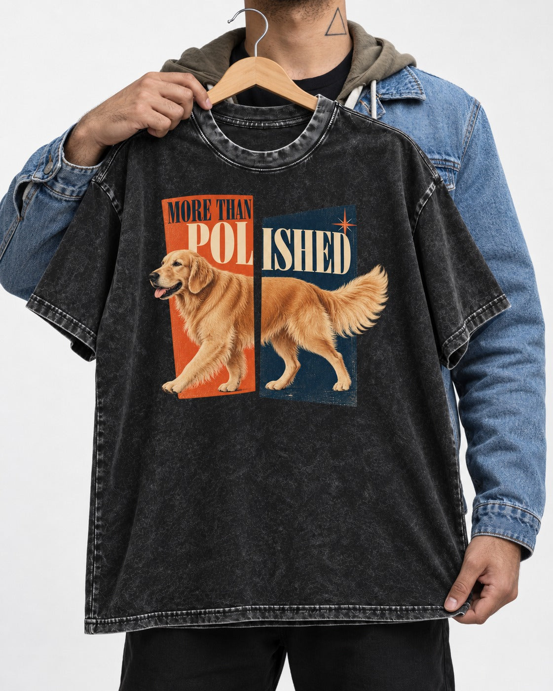 Golden Retriever More Than Polished Split Panel Graphic Washed Tee in Black, held up on a hanger