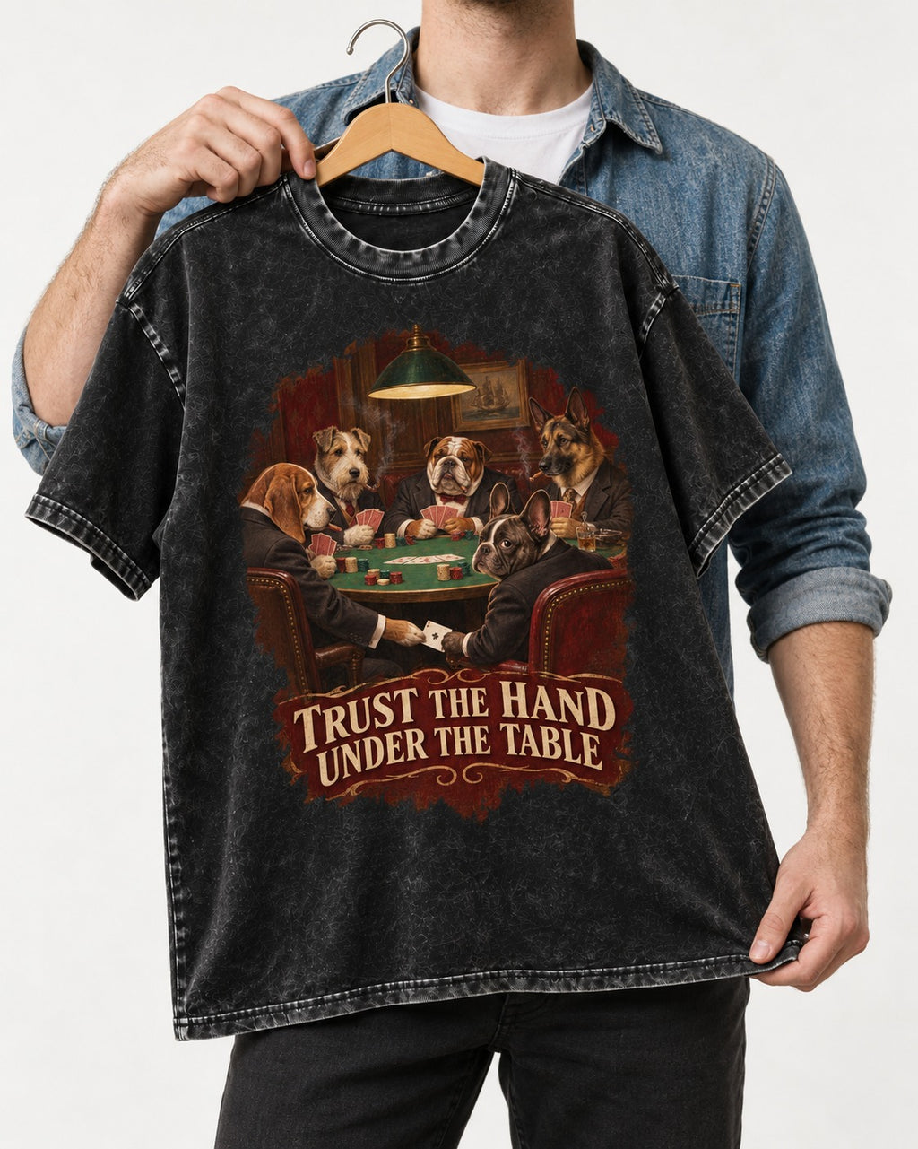 Frenchie Trust the Hand Under the Table Poker Dogs Graphic Washed Tee in Black, held up on a hanger