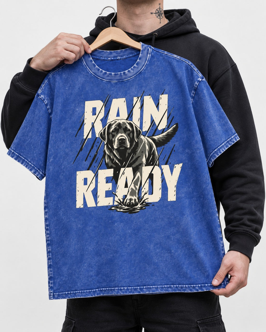 Labrador Retriever Rain Ready Charging Splash Graphic Washed Tee in Royal Blue, held up on a hanger