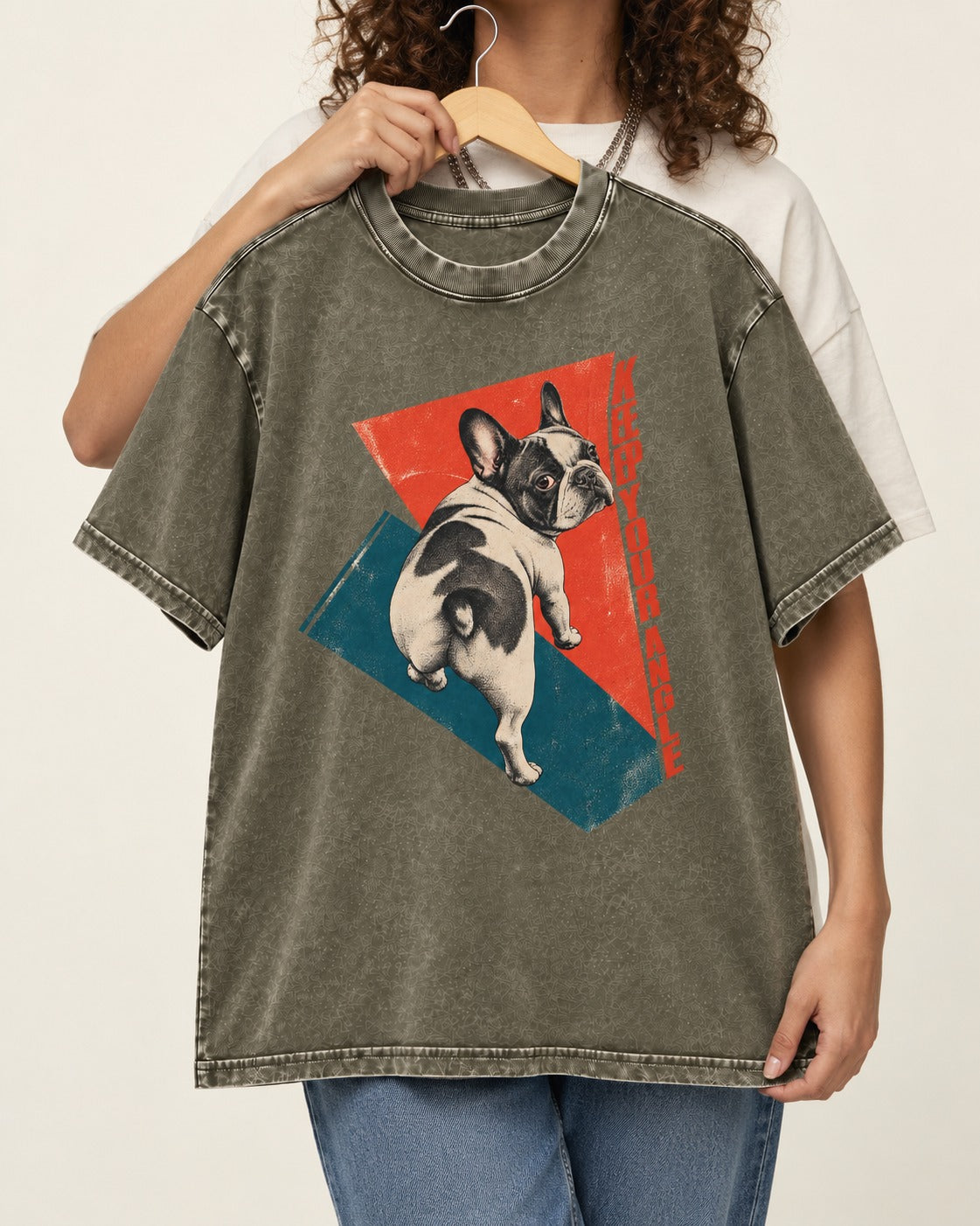 Frenchie Keep Your Angle Geometric Graphic Washed Tee in Army Green, held up on a hanger