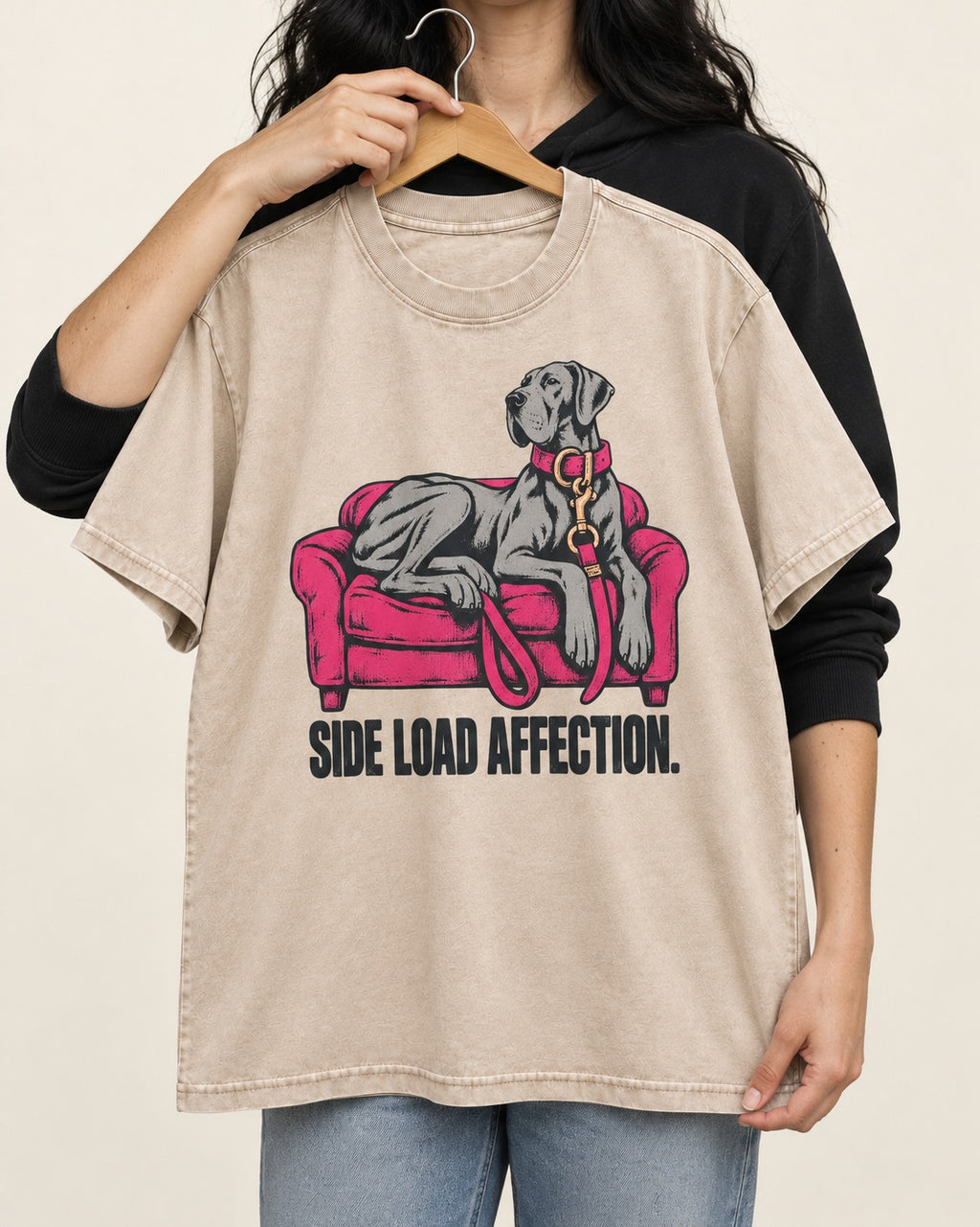 Great Dane Side Load Affection Washed Tee in Apricot, held up on a hanger