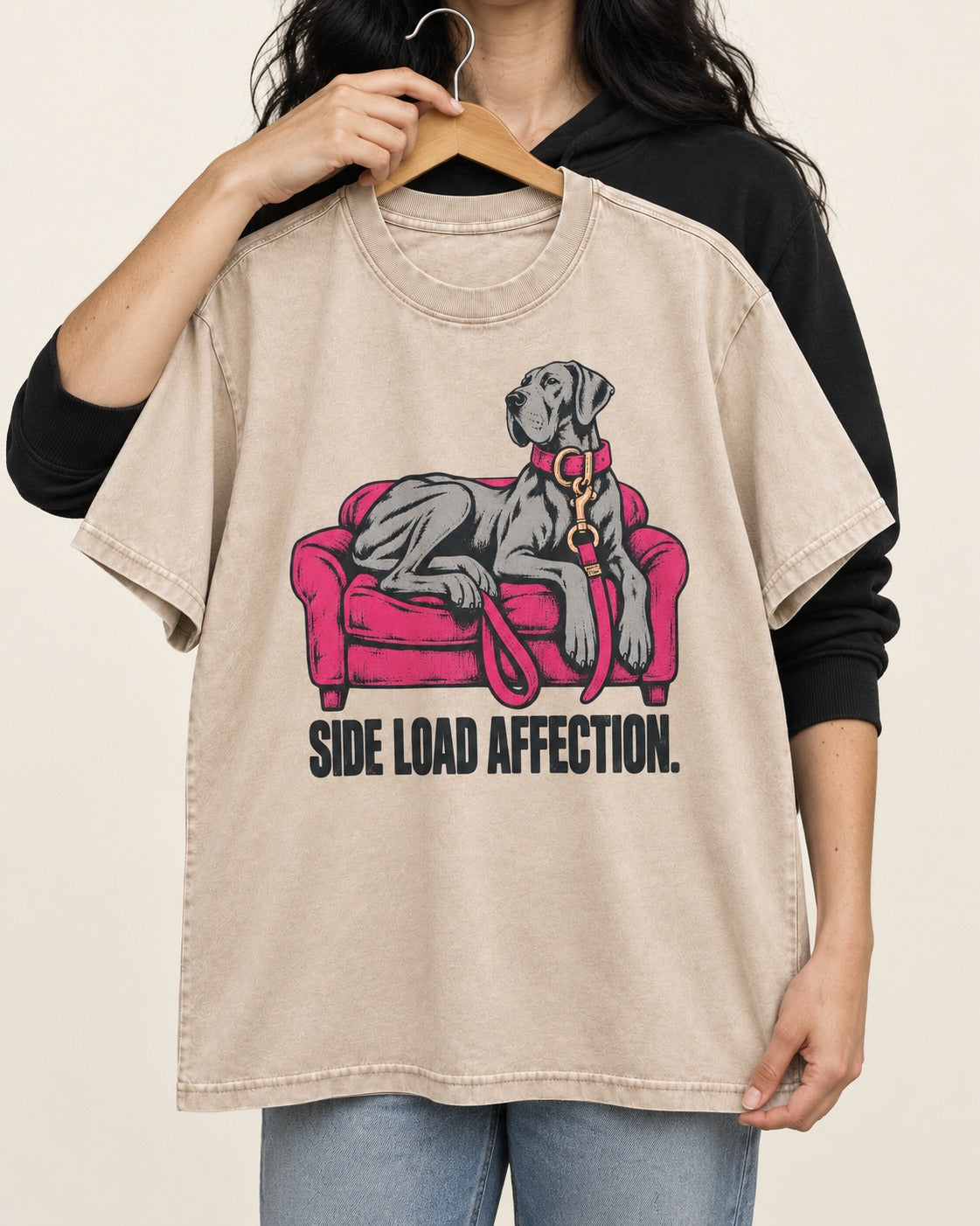 Great Dane Side Load Affection Washed Tee in Apricot, held up on a hanger