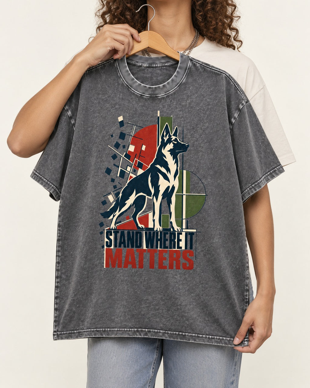 Stand Where It Matters German Shepherd Dog Washed Tee in Gray, held up on a hanger