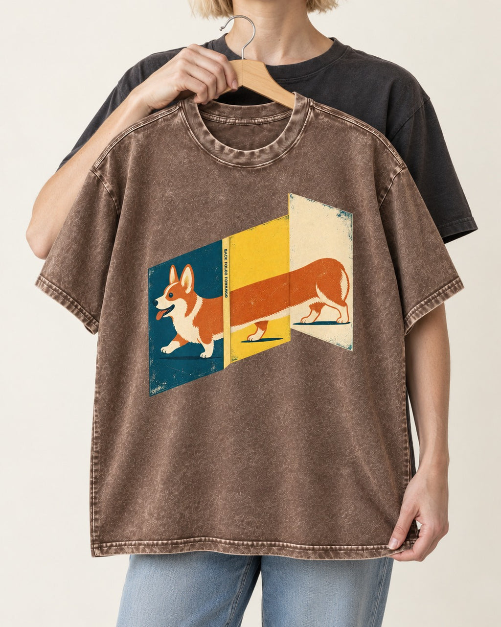 Corgi Back Folds Forward Panels Washed Tee in Coffee, held up on a hanger