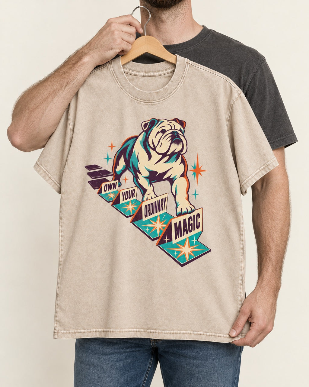 English Bulldog's Ordinary Magic Washed Tee in Apricot, held up on a hanger