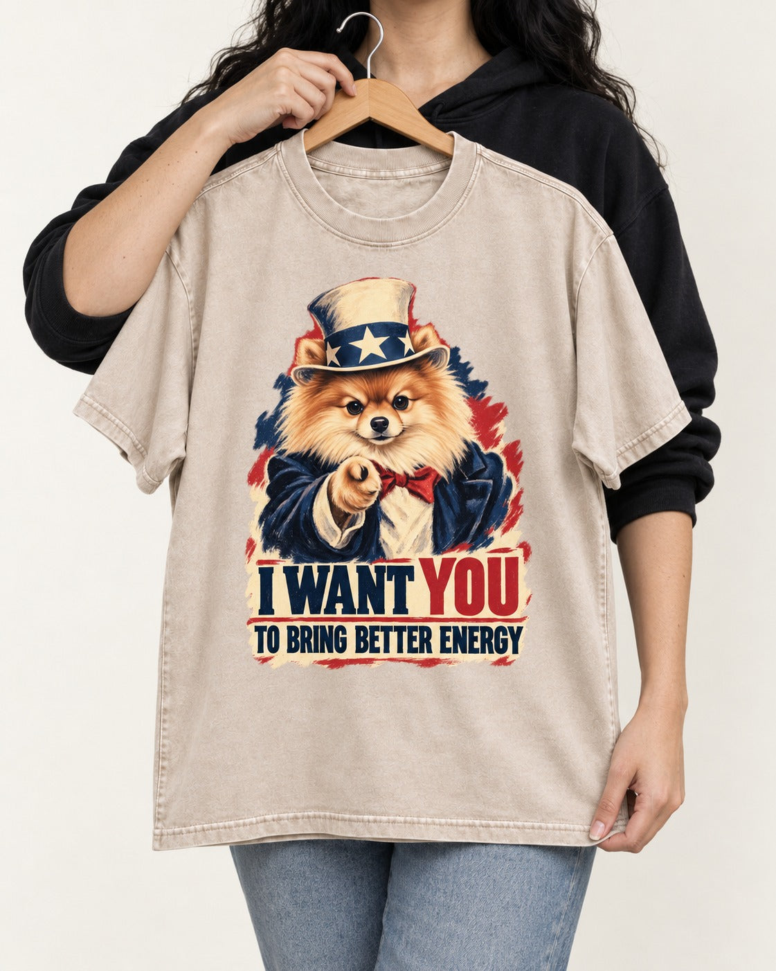 Pomeranian I Want You to Bring Better Energy Uncle Sam Graphic Washed Tee in Apricot, held up on a hanger