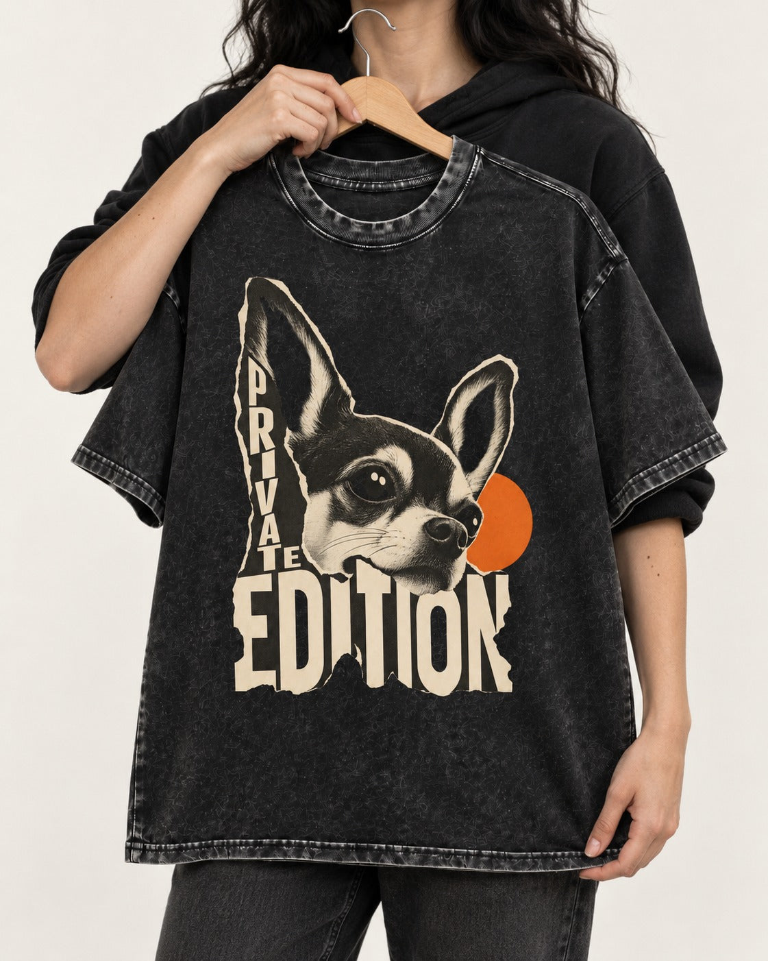 Chihuahua Private Edition Cut-Paper Portrait Washed Tee in Black, held up on a hanger