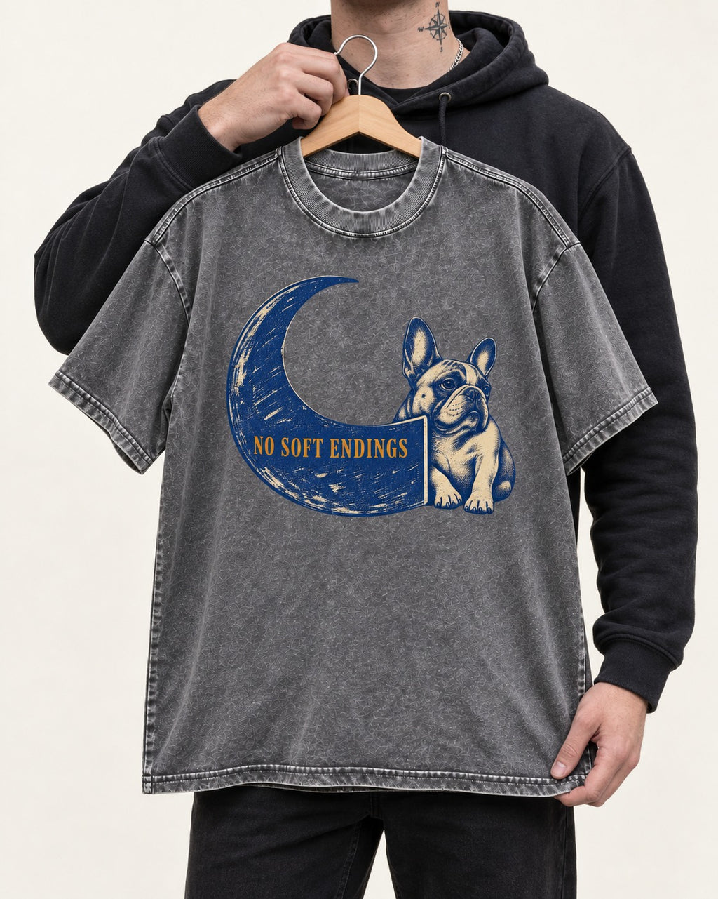 Frenchie No Soft Endings Crescent Graphic Washed Tee in Gray, held up on a hanger