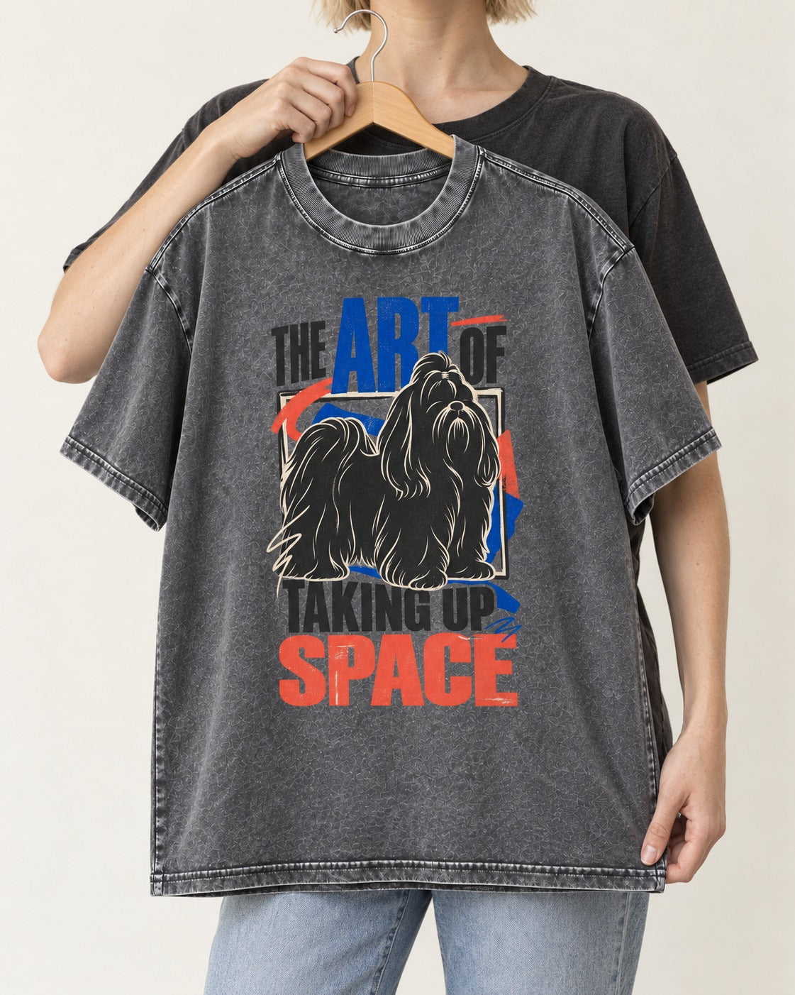 Shih Tzu Taking Up Space Washed Tee in Gray, held up on a hanger