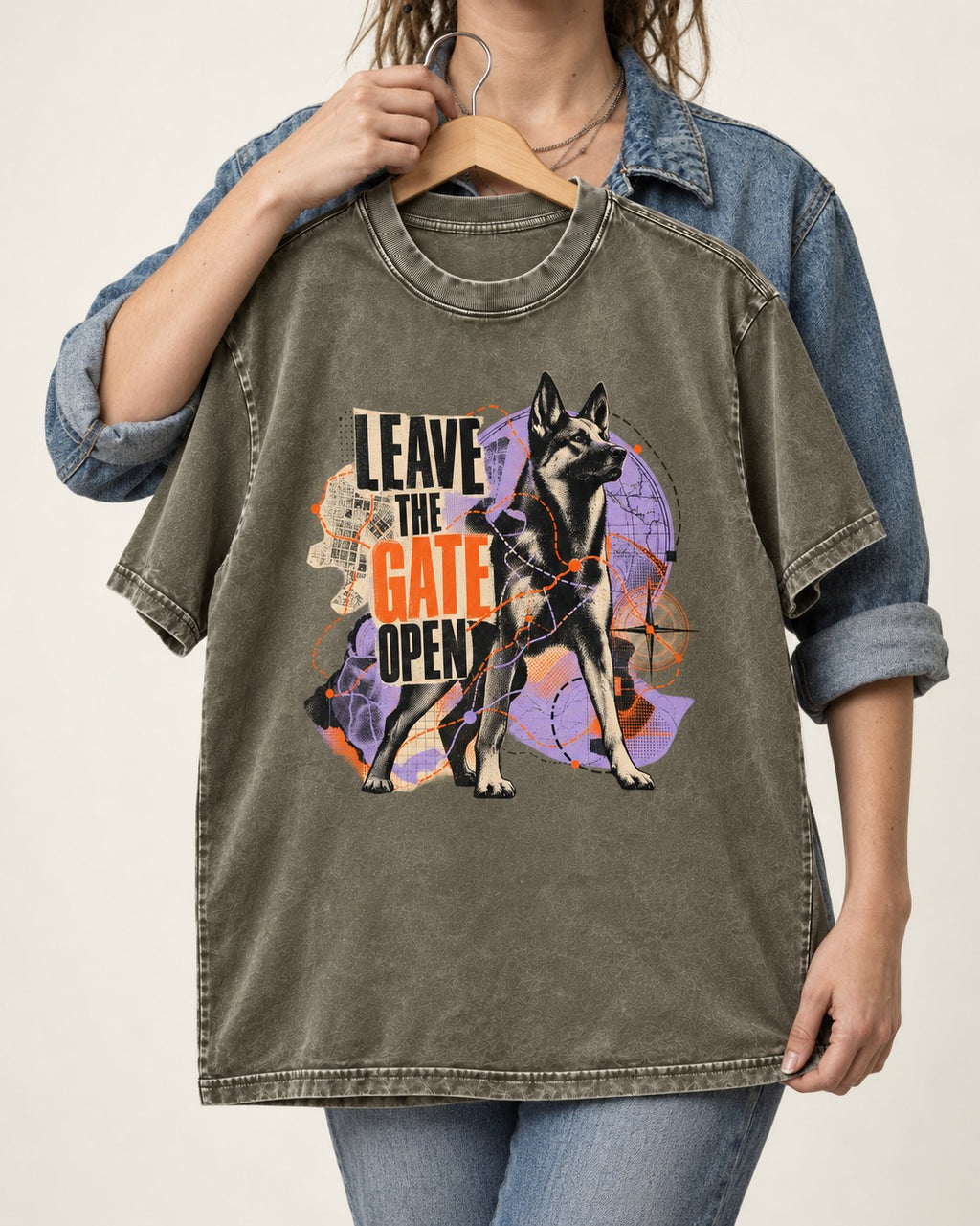 Leave The Gate Open Transit Collage German Shepherd Dog Graphic Washed Tee in Army Green, held up on a hanger