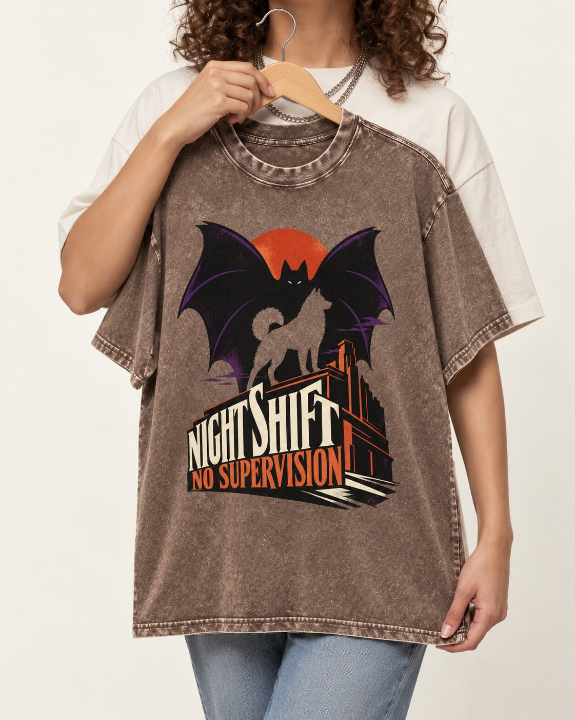 Husky Night Shift No Supervision Washed Tee in Coffee, held up on a hanger
