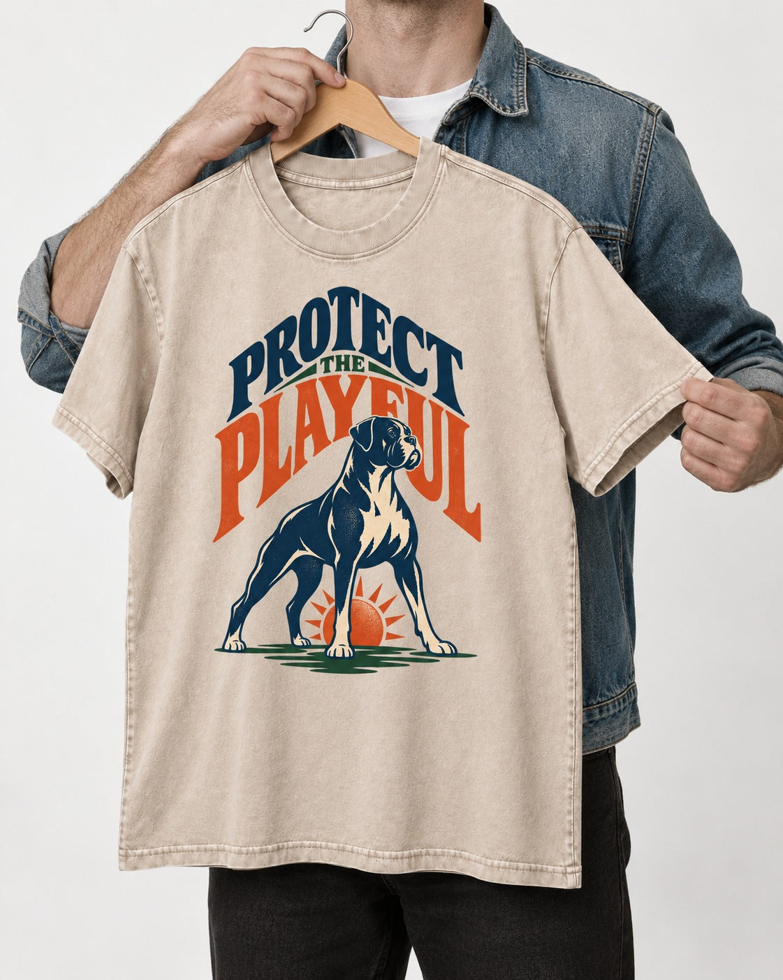Protect the Playful Boxer Washed Tee in Apricot, held up on a hanger