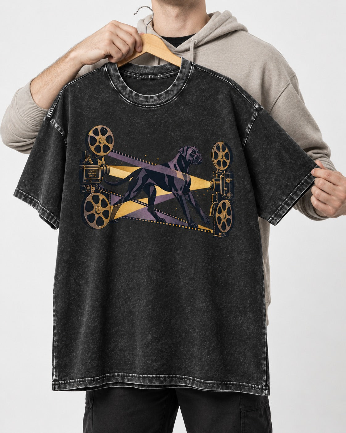 Light Never Waits Boxer Cinema Graphic Washed Tee in Black, held up on a hanger