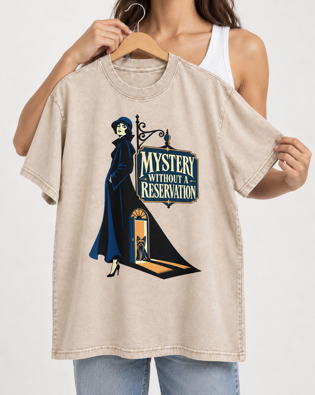 Mystery Without a Reservation Yorkshire Terrier Washed Tee in Apricot, held up on a hanger