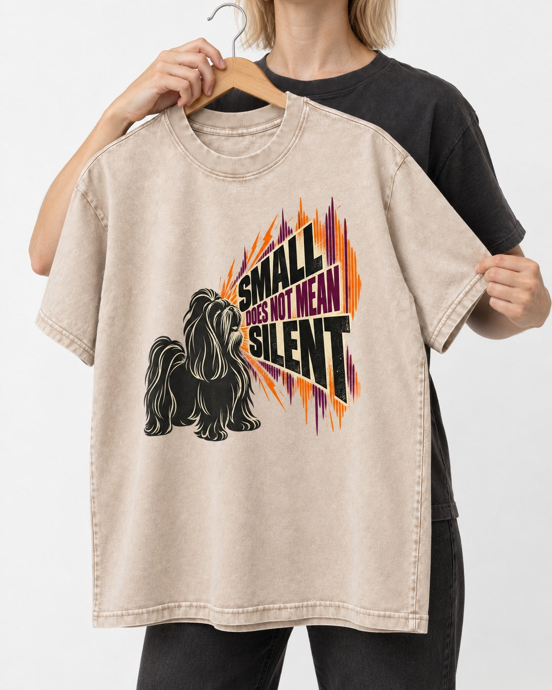 Small Not Silent Shih Tzu Washed Tee in Apricot, held up on a hanger