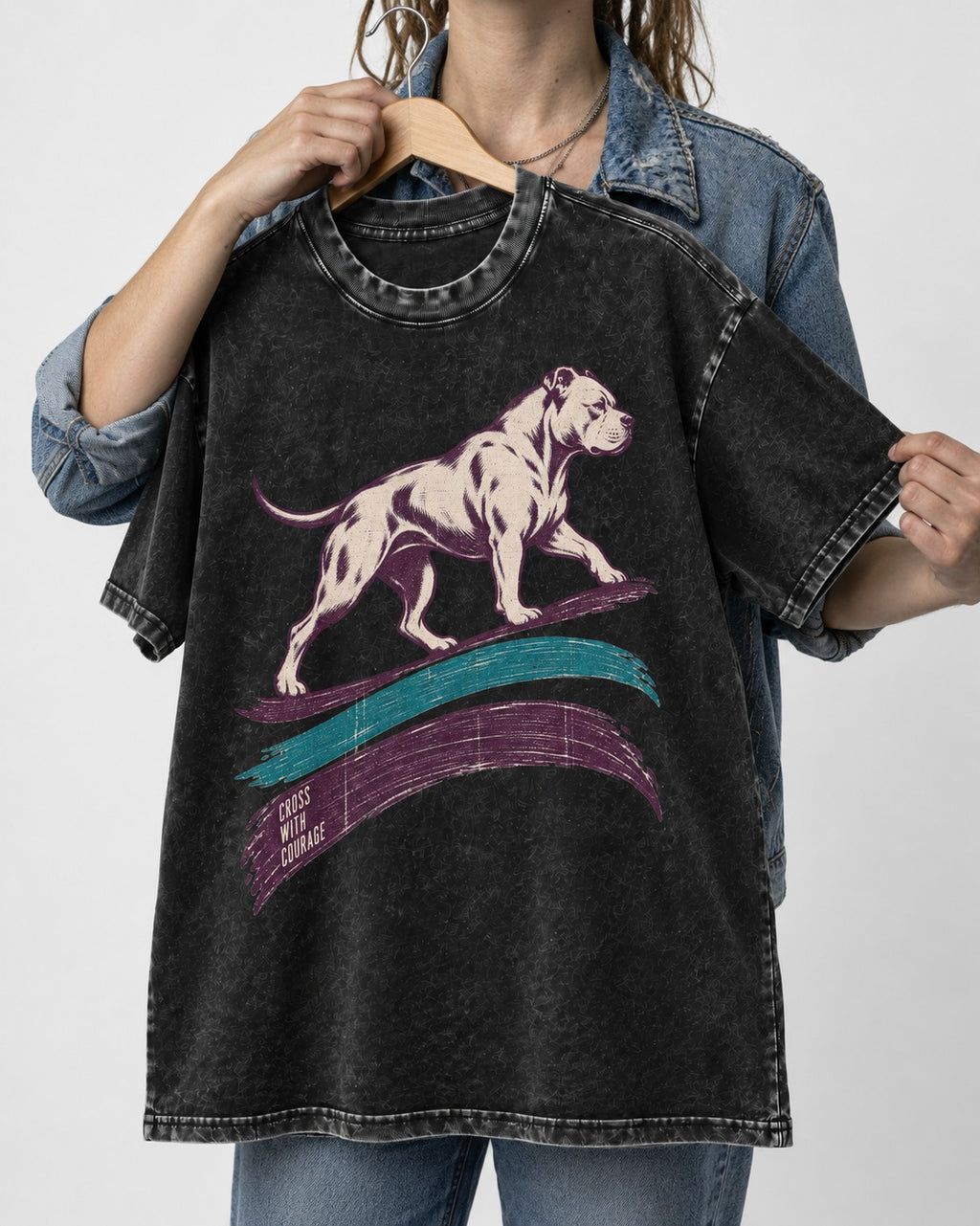 Pitbull Cross with Courage Brushstroke Graphic Washed Tee in Black, held up on a hanger