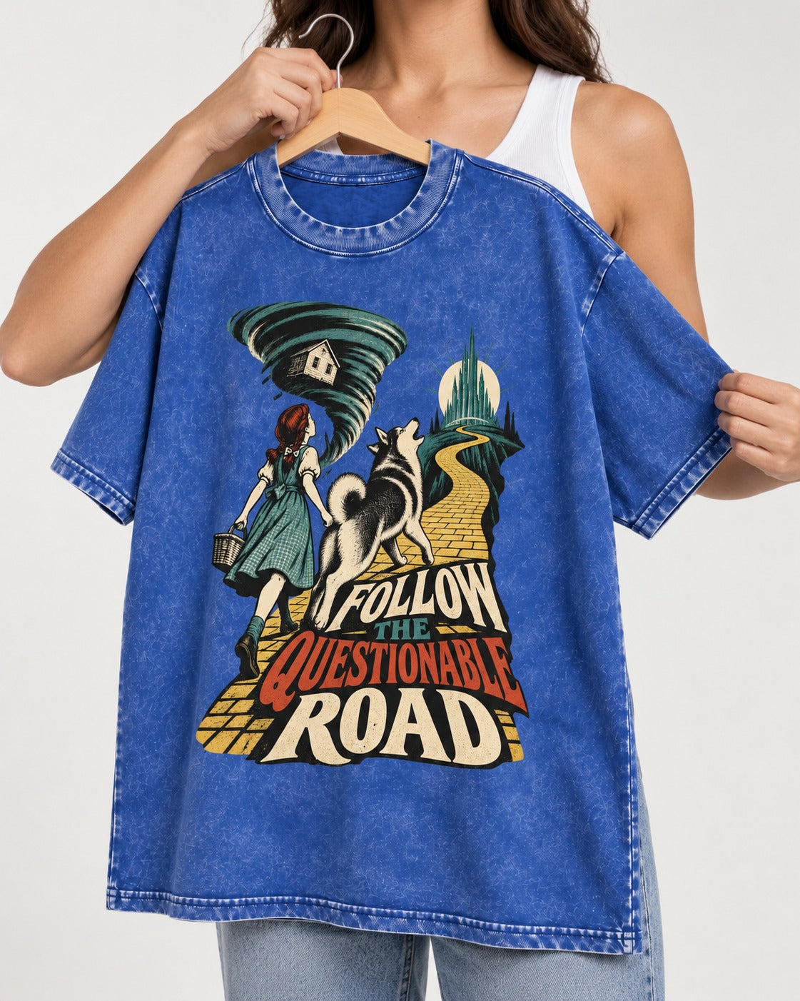 Husky Follow the Questionable Road Tornado Graphic Washed Tee in Royal Blue, held up on a hanger
