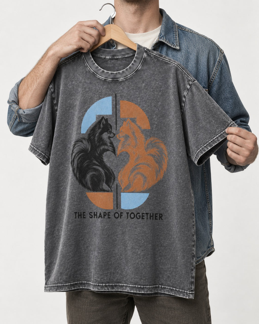Pomeranian The Shape of Together Washed Tee in Gray, held up on a hanger