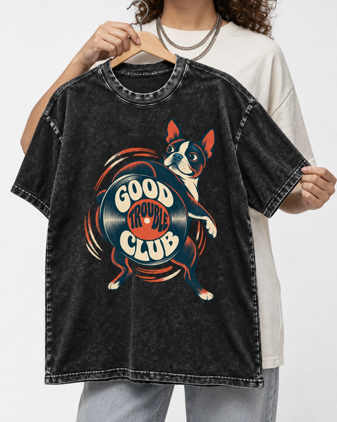 Good Trouble Club Boston Terrier Washed Tee in Black, held up on a hanger