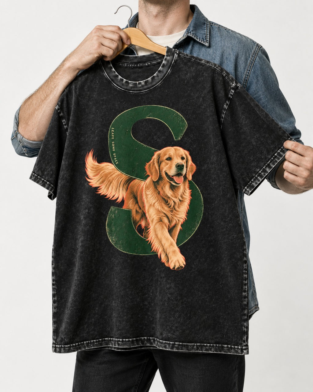 Golden Retriever Leave Some Space Monogram Graphic Washed Tee in Black, held up on a hanger