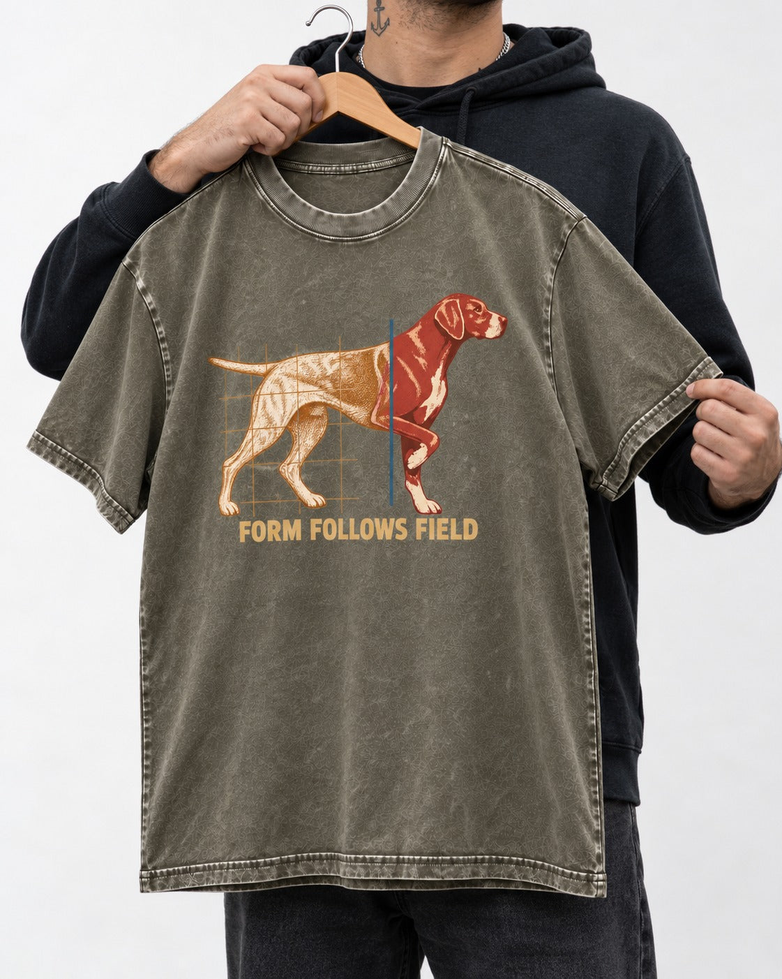 German Shorthaired Pointer Form Follows Field Grid Graphic Washed Tee in Army Green, held up on a hanger